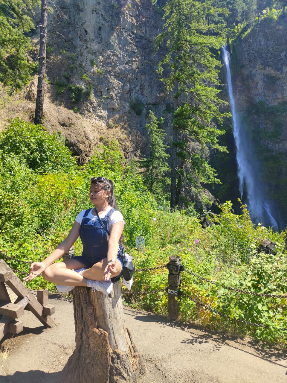 Meditating by a waterfall