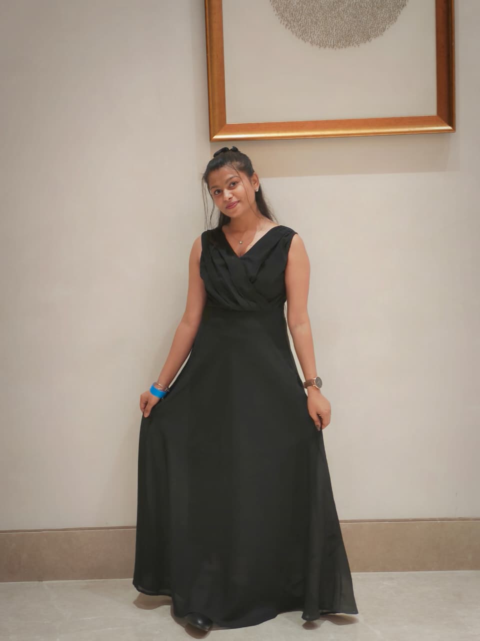 Sanskriti in a flowing black gown